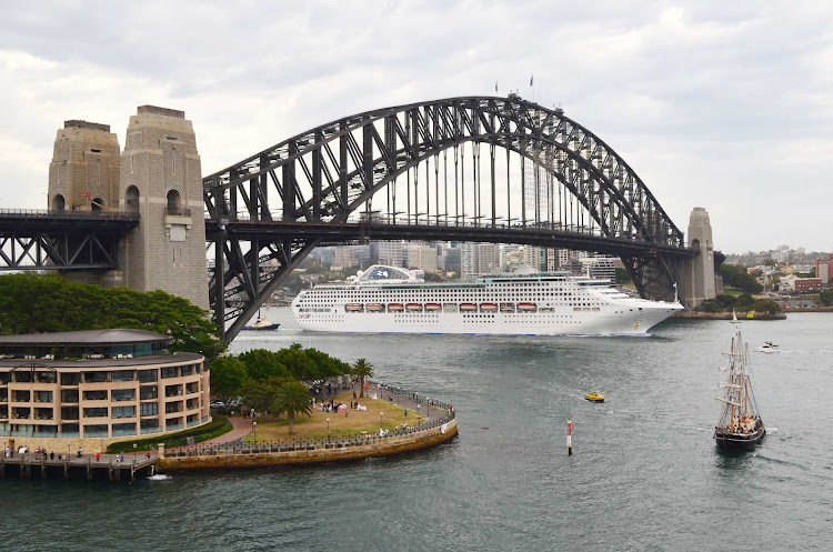 Sea Princess passes beneath Sydney Harbour Bridge following her departure from Darling Harbour. 