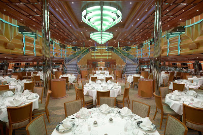 The two-level Northern Lights Restaurant, one of Carnival Magic's main dining halls, has formal (assigned) seating in the lower level, and the more flexible open-table option above.