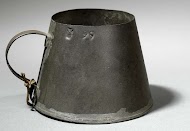 Kegelvormige maat met handvat