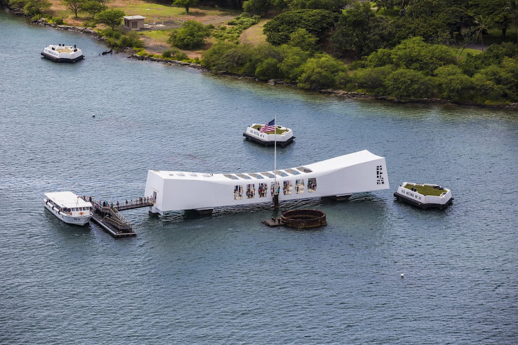 An aerial view of the USS Arizona Memorial, visited by more than 1 million people each year. 
  
