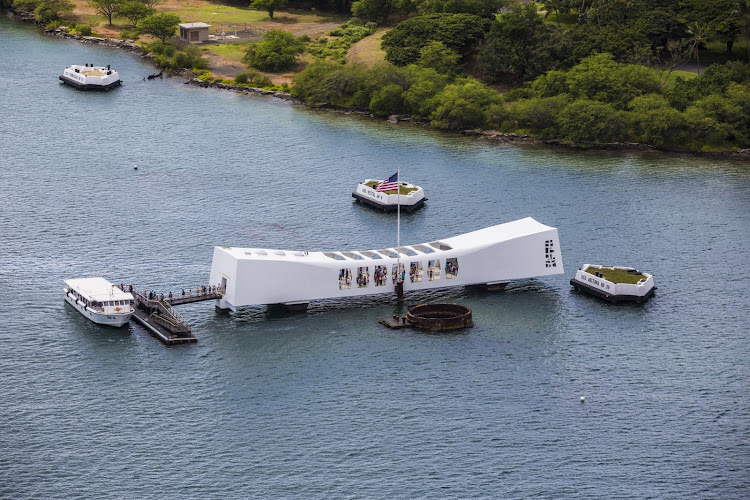 An aerial view of the USS Arizona Memorial, visited by more than 1 million people each year. 
  
