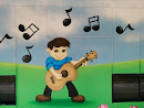 Boy and Guitar Mural