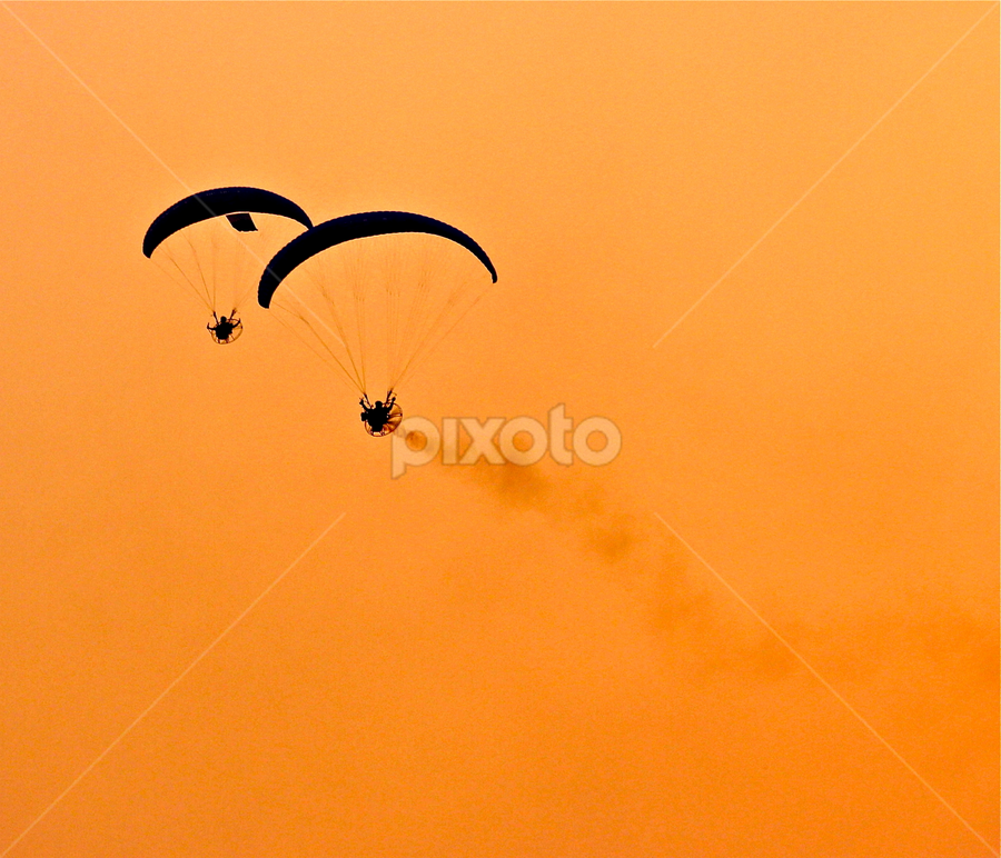 Paratroopers silhouetted against the sky at dawn by Nashira Usef - News & Events World Events