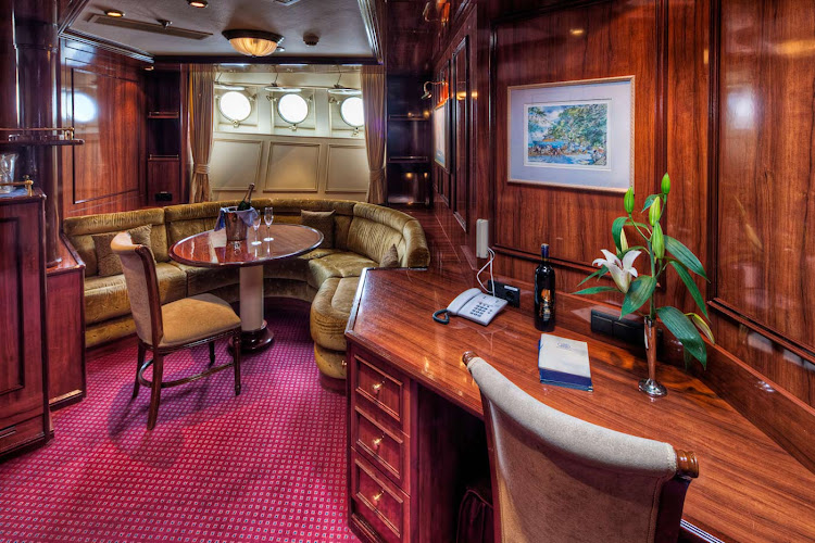 Royal Clipper's Owners Suites offers guests a spacious sitting area, king-size bed, mini-bar, full marble bathroom and more.