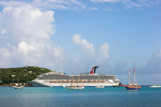 Smaller ships in the Caribbean stop by to check out Carnival Valor.