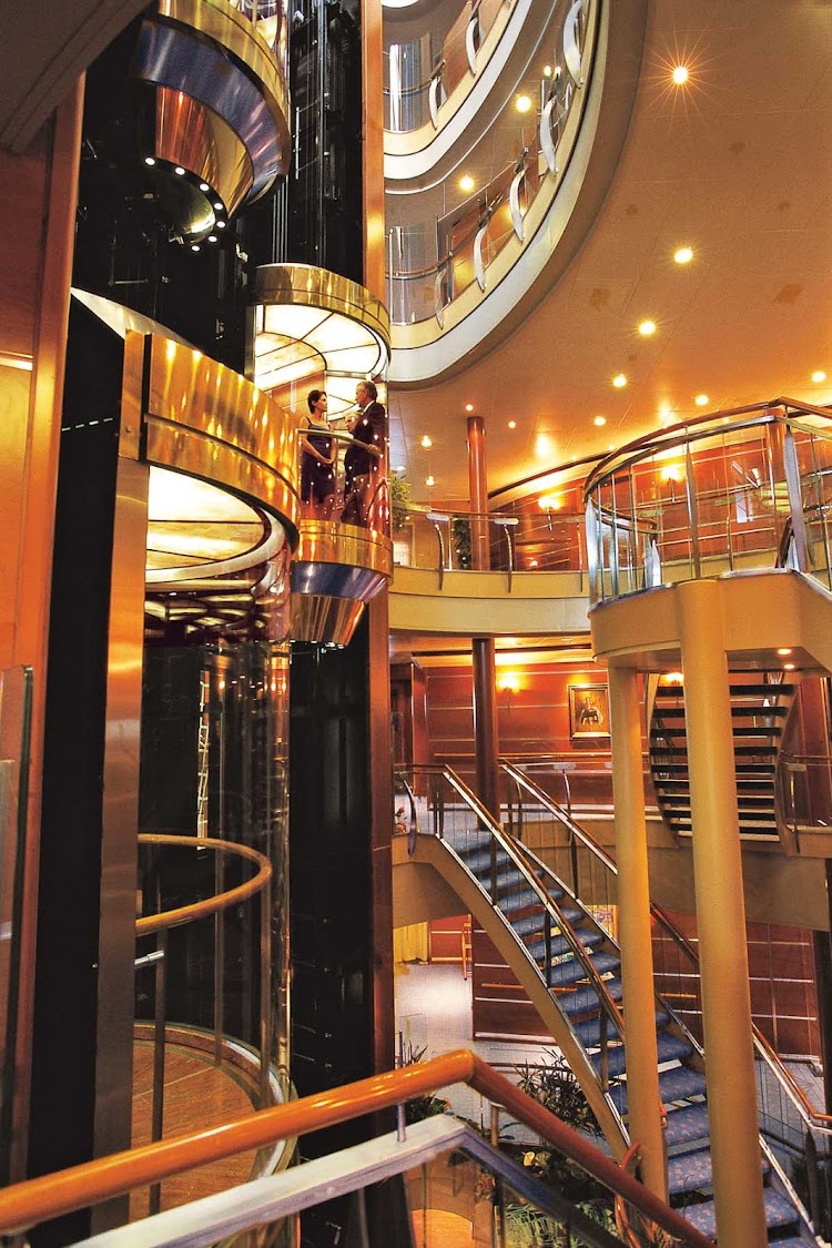 The abundance of space throughout the ship, including the Atrium here, will impress you during your stay on Seven Seas Navigator.