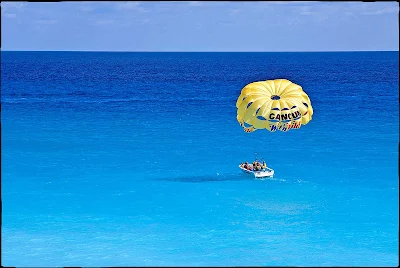 Getting ready for a parasail in Cancun, Mexico.