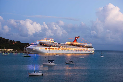  Carnival Valor at dusk, when the evening entertainment is just beginning. 
