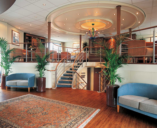 Viking-River-Cruises-Europe-Reception - Each new port call means another tour included in the price of a Viking River Cruise.  Passengers gather in the longship’s reception area for the tour, or they may hang out 
in the Internet/Library area upstairs to take advantage of the good port-side Internet  connection (WiFi is free).