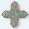 Tile in the shape of a cross with scrolls and birds