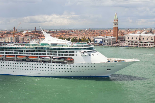 Grandeur-of-the-Seas-Venice-San-Giorgio - Grandeur of the Seas sails past the island of San Giorgio Maggiore, Venice, Italy. The ship now sails to the Caribbean.