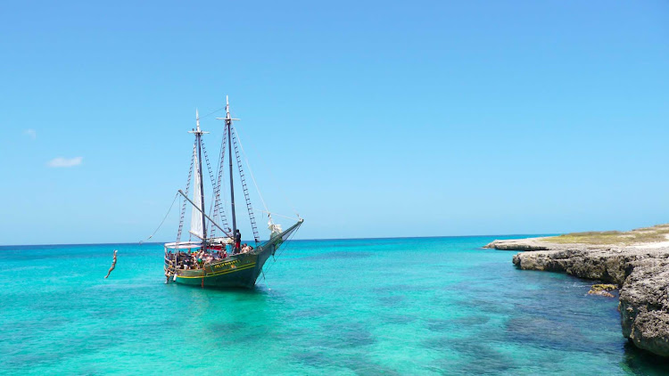 One way to spend the day in Aruba is by water on a sailing tour of the island.