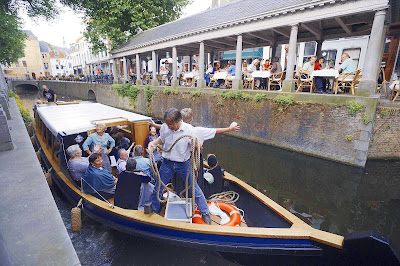 A boat on a canal in Gouda, the Netherlands. 