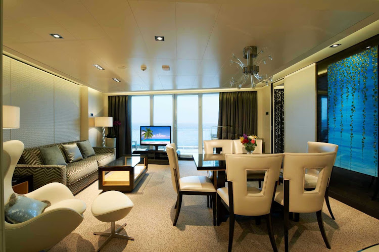 A contemporary living and dining area with room to spread out is one of the things guests love about the Norwegian Breakaway's Deluxe Owner's Suite.