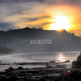  Sunrise over Sipelot by Pradono Gunawan - Landscapes Beaches