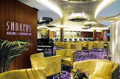 Sophisticated interiors and drinks will welcome you at Shaker's Martini & Champagne Bar.