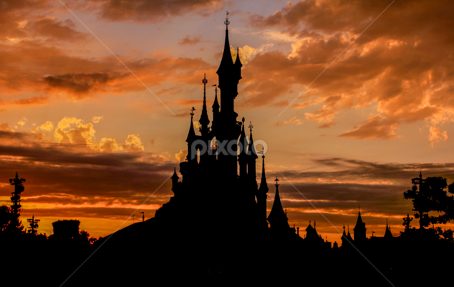 disneyland castle sunset