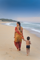 Mother and Son on the beach by Ivon Murugesan -  