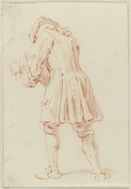 Staande voorover genegen man op de rug gezien