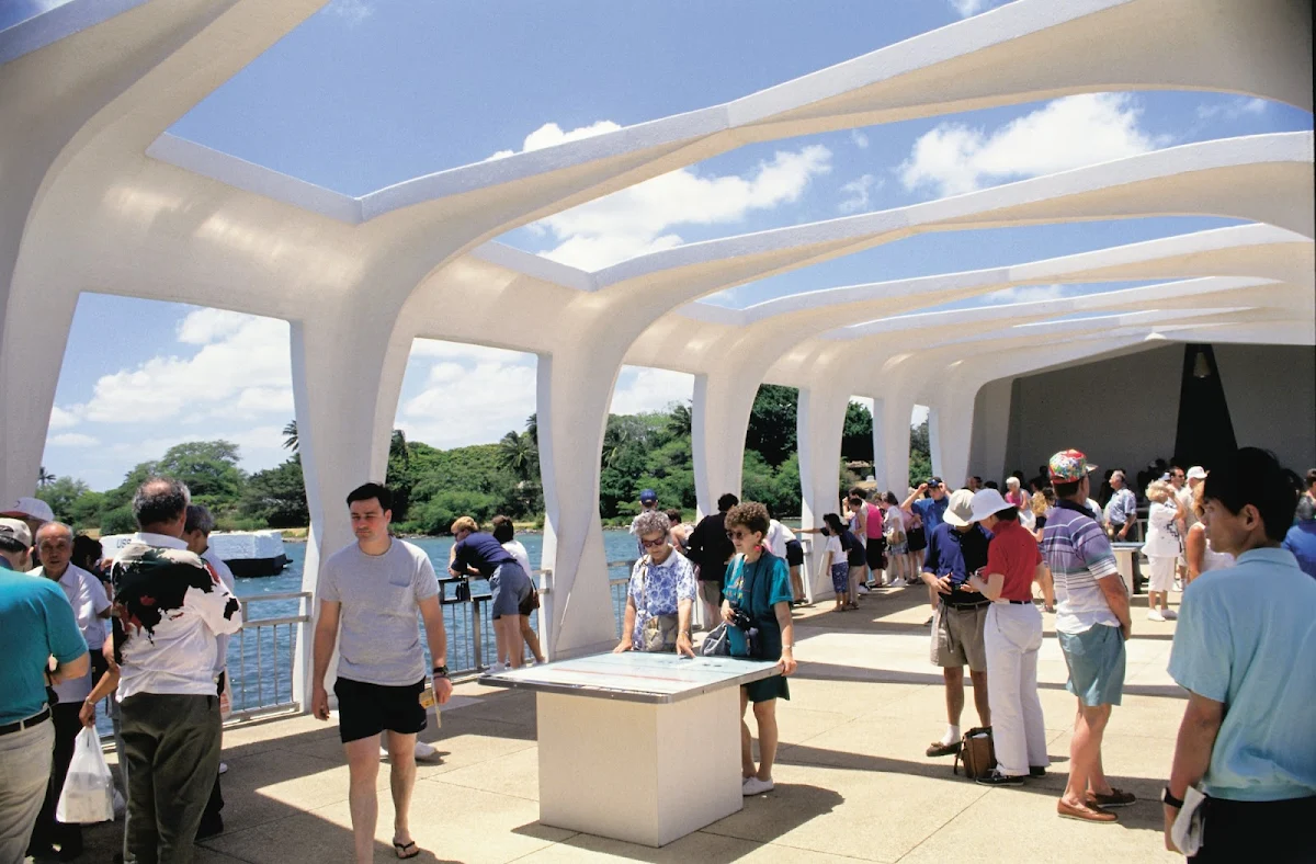 USS-Arizona-Memorial - Visitors inside the USS Arizona Memorial in Honolulu. The memorial straddles the sunken hull of the battleship USS Arizona and commemorates the 1941 Japanese attack on Pearl Harbor. 
 