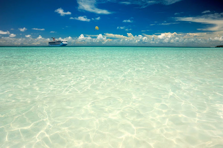 Book passage on Carnival Breeze to the warm waters of Half Moon Cay in the Bahamas.