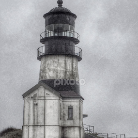 It was windy and raining when I arrived at the lighthouse. The b&w processing suits the mood of the day. by Gabi Fulcher - Buildings & Architecture Other Exteriors
