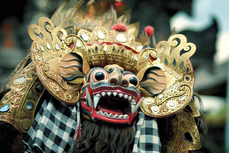 Take in the Tiger Dance when you visit Bali, Indonesia, on a Silversea cruise.