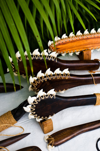 Traditional Hawaiian Koa war clubs, made partly of shark teeth.