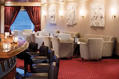 Head to Silver Whisper's bar lounge for music, a dance floor, complimentary cocktails and a place to mix and mingle.

