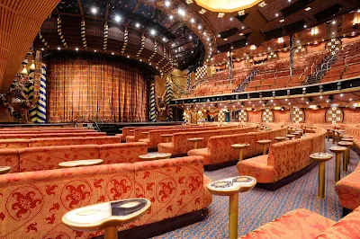 On your next Caribbean cruise, take in one of the Broadway-style shows at Carnival Liberty's beautiful 3-deck-high Venetian Palace.