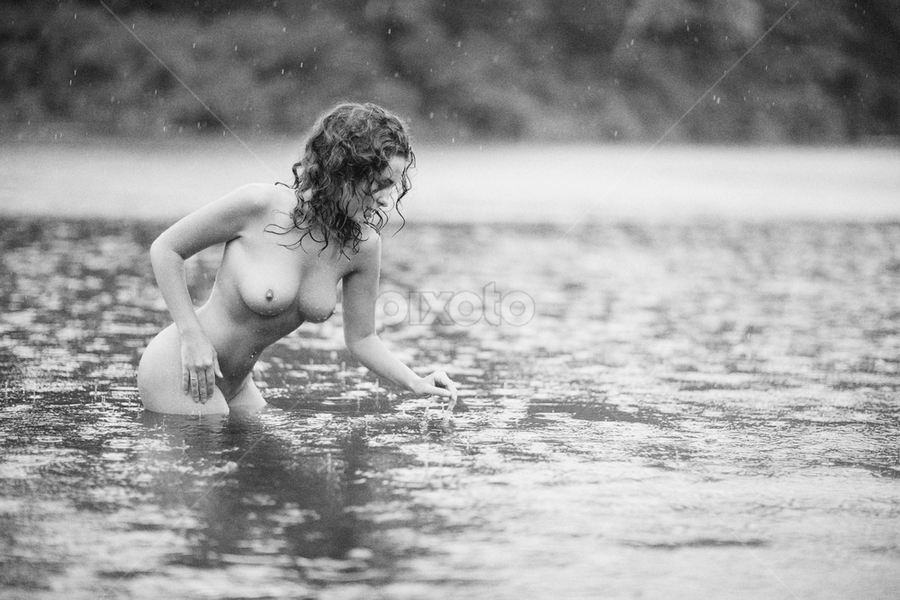 Nude in rain