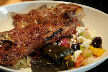 Grilled Blade Chops over Greek Salad