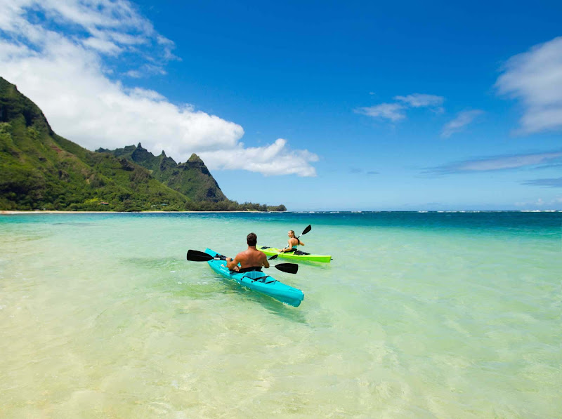 A couple kayaks at Makua Beach in Hanalei, Kauai.