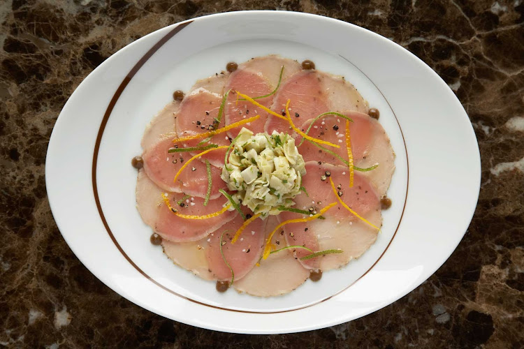 The tuna carpaccio prepared in Celebrity Cruises's Tuscan Grille.