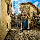 houses with blue doors by Eseker RI -  