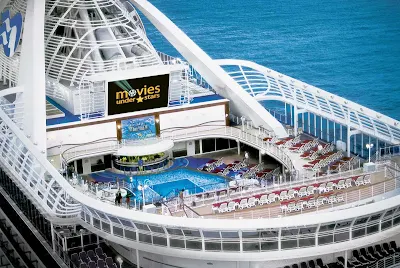 Watch the latest films, family fare and sporting events on a 300-square-foot digital screen while relaxing at the pool under a backdrop of sea and stars on your Princess cruise.  

 

