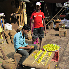 lemon vendor by Venkat Krish - People Street & Candids