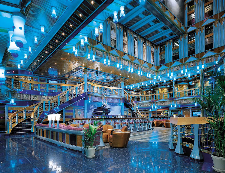 Enjoy the cool ocean vibe of the Metropolis Atrium Bar when you sail on Carnival Miracle.