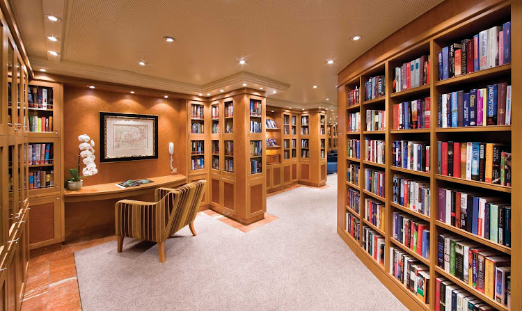 Sit back with a novel in the peace and quiet of Seven Seas Voyager's well-stocked Library.