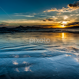 Waves retreating by Keith Homan -  