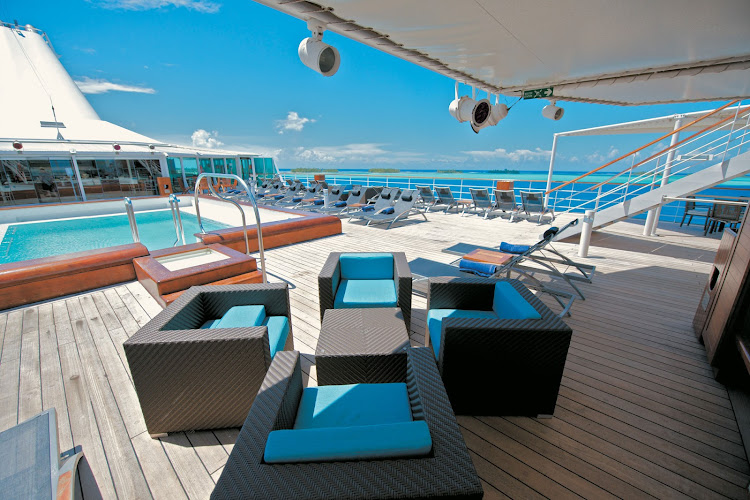 The pool deck aboard the Paul Gauguin offers sweeping views, ample seating and a pool bar.