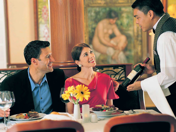  Evocative of small eateries in France, Le Bistro offers an elegant dining experience with crisp white linens, an intimate atmosphere and attentive service. (This shot was taken on Norwegian Dawn.) 