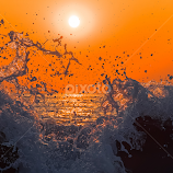 Sunset and splash wave by Masaki Yamamoto -  
