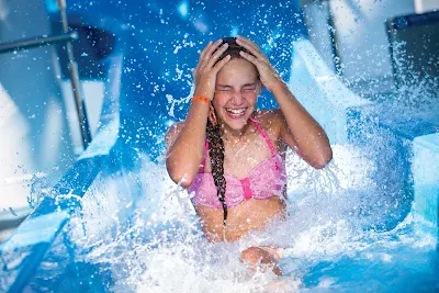 Get a thrill by zipping down the Aqua Park water slide during your Norwegian Cruise Line vacation.