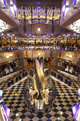 The atrium is a popular gathering spot on Costa Favolosa.