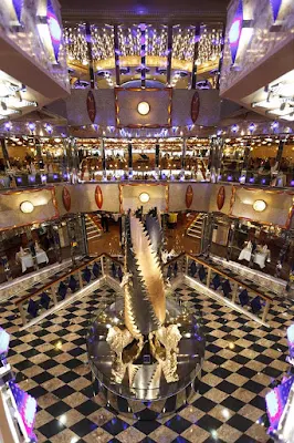 The atrium is a popular gathering spot on Costa Favolosa.