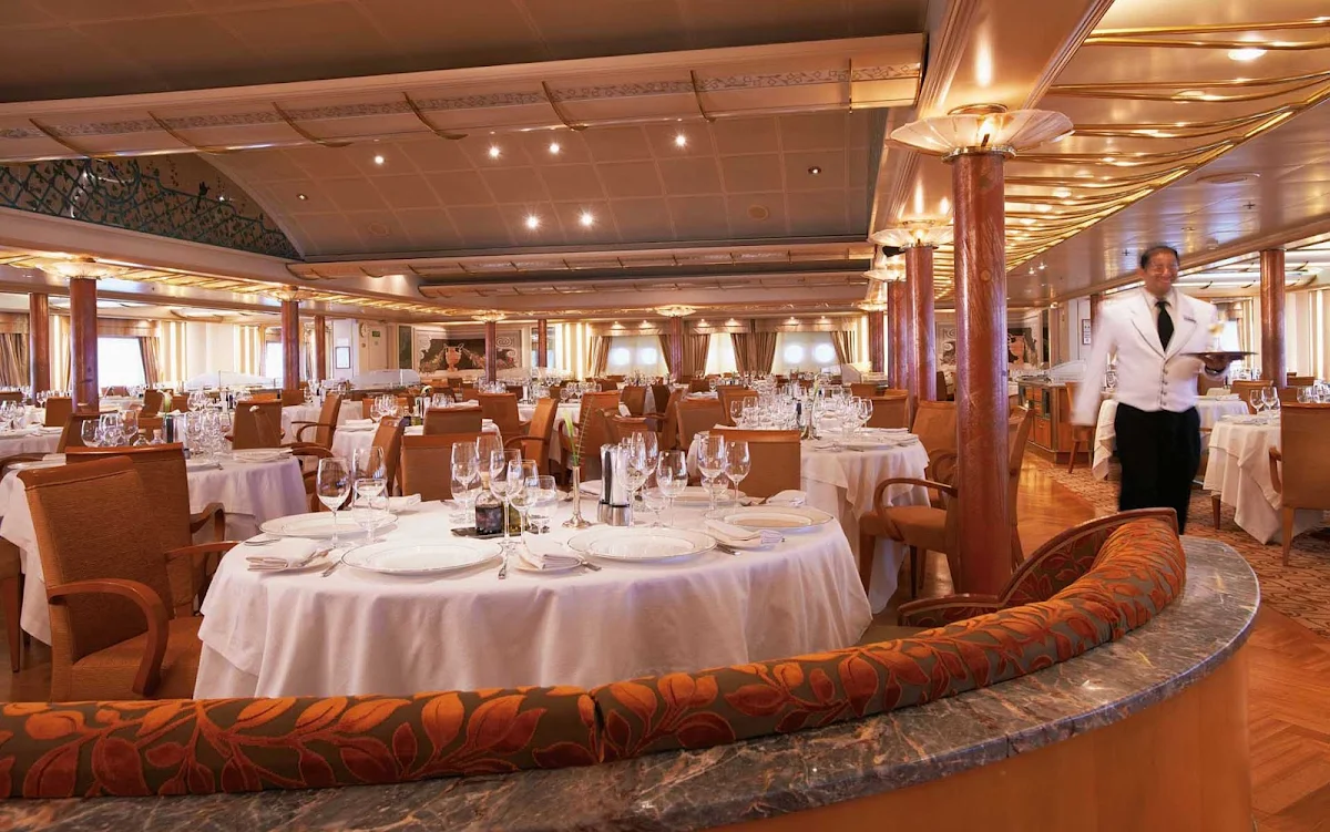 Silver_Cloud_The_Restaurant - The Restaurant, Silver Cloud's main dining room, features international dishes prepared by master chefs. Each dish is tailored to match the ship's destination.