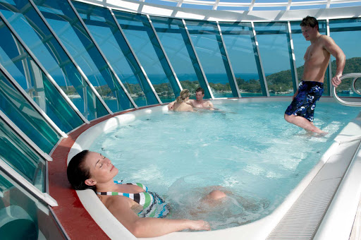 Liberty-of-the-Seas-whirlpool - Liberty of the Seas has six glorious whirlpools, two of them cantilevered whirlpools overlooking the ocean.
