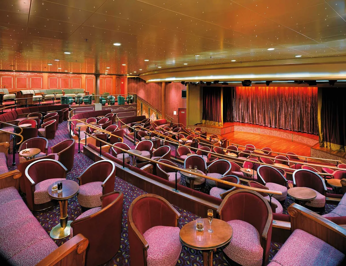Silversea_theater - The plush theater aboard Silver Whisper is big enough for Broadway-style shows. Performances take place daily.