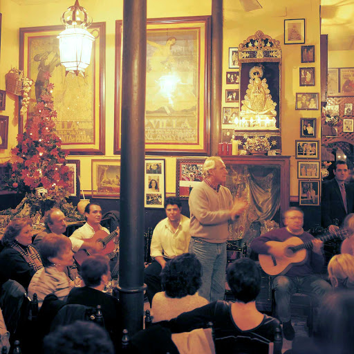 Taberna-Flamenca-Seville-Spain - In the taverns throughout Spain, you can hear live music and join in the singing. You might even catch a traditional Flamenco dance. 